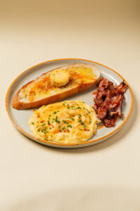 scrambled egg rose with caramelized bacon